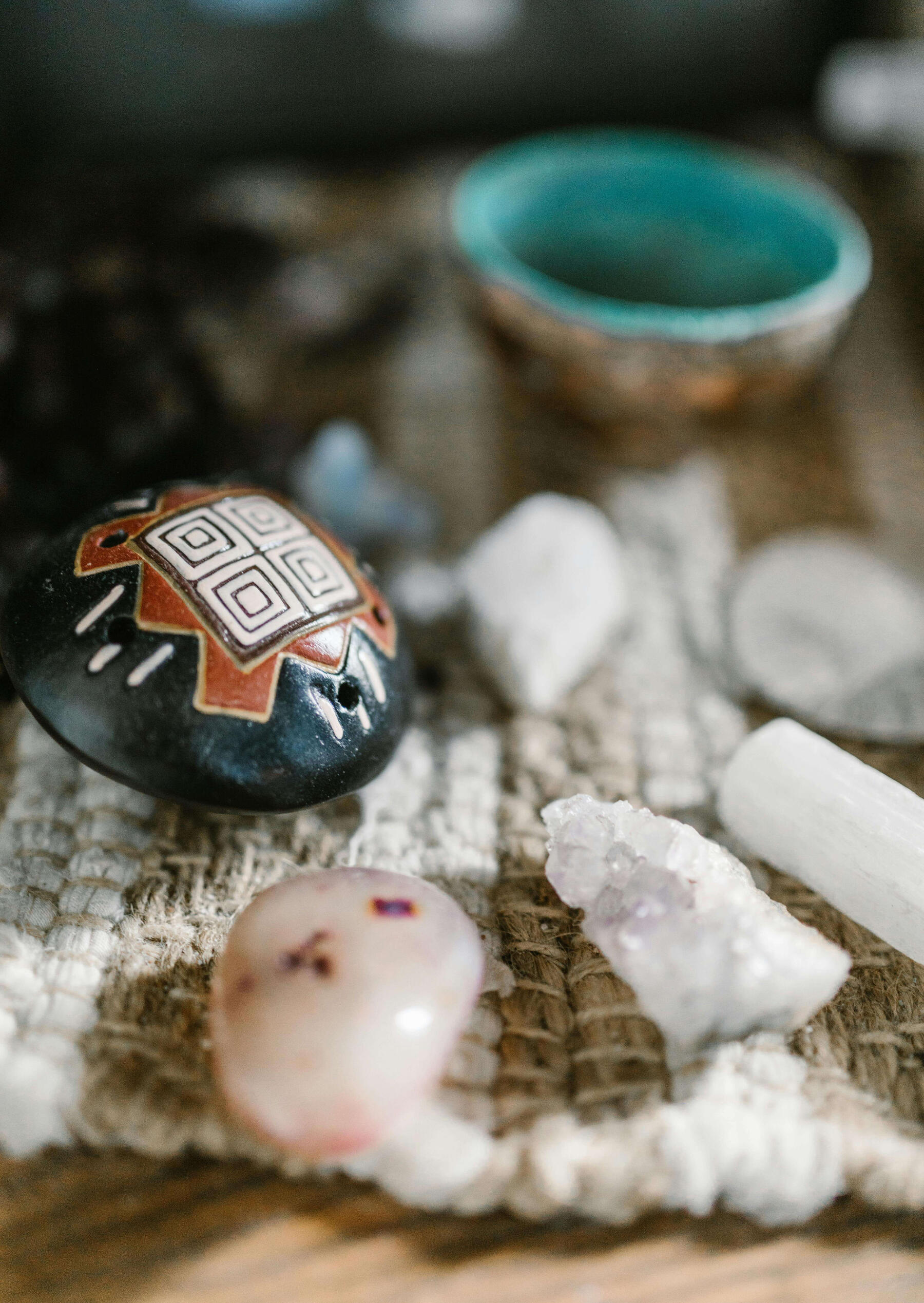 This is a photo of some white crystals and painted rock.